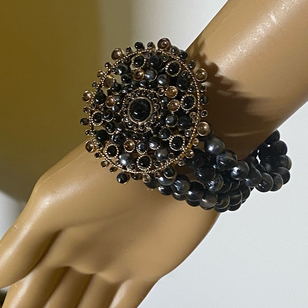 black pearl and embellished bracelet